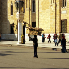 Cairo city life (man carrying bread)