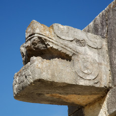 Sculptured head at a Chichen Itza platform